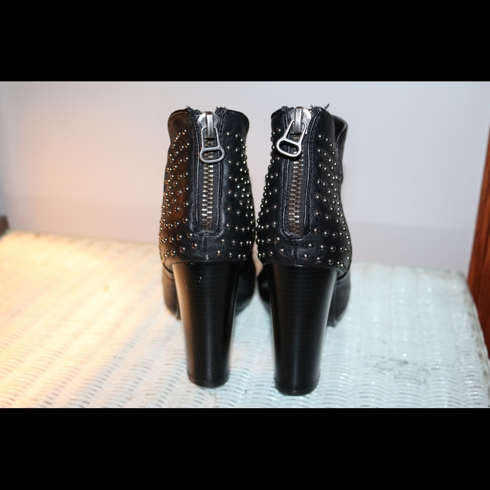 Stylish studded high black boots